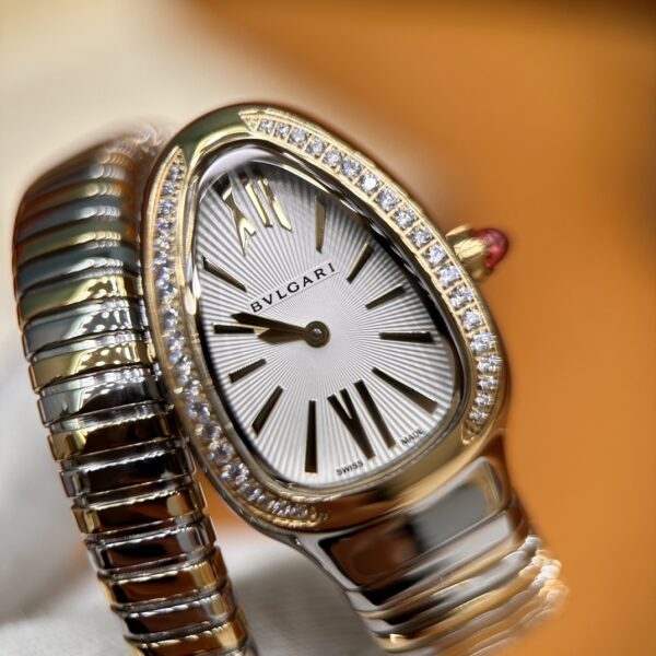 BVLGARI SERPENTI Series 103648 (Two-Tone, Stainless Steel & 18K Gold, Diamond Bezel, White Lacquered Dial, Pink Spinel Crown, Swiss Quartz Movement)