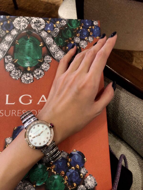 BVLGARI LVCEA Series 102196 (28mm, Stainless Steel, White Mother-of-Pearl Dial, Diamond Hour Markers, Red Cabochon Gem Crown, Swiss Quartz Movement)