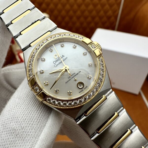 2 Omega Constellation, Mother-of-Pearl Dial with Gold and Diamond, 29mm, Automatic Mechanical 131.25.29.20.55.002