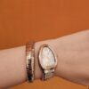BVLGARI SERPENTI Series 103648 (Two-Tone, Stainless Steel & 18K Gold, Diamond Bezel, White Lacquered Dial, Pink Spinel Crown, Swiss Quartz Movement)