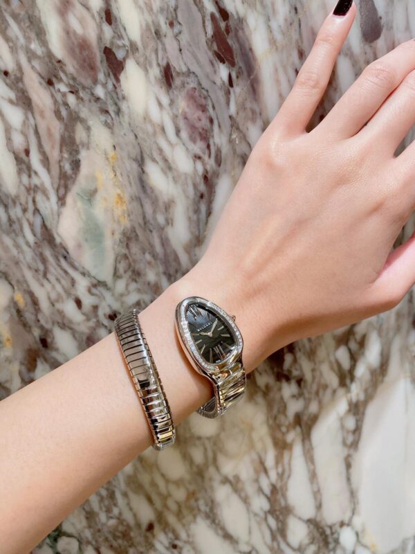 BVLGARI SERPENTI Series 103524 (Silver, Stainless Steel, Diamond Bezel, White Lacquered Dial, Pink Spinel Crown, Swiss Quartz Movement)
